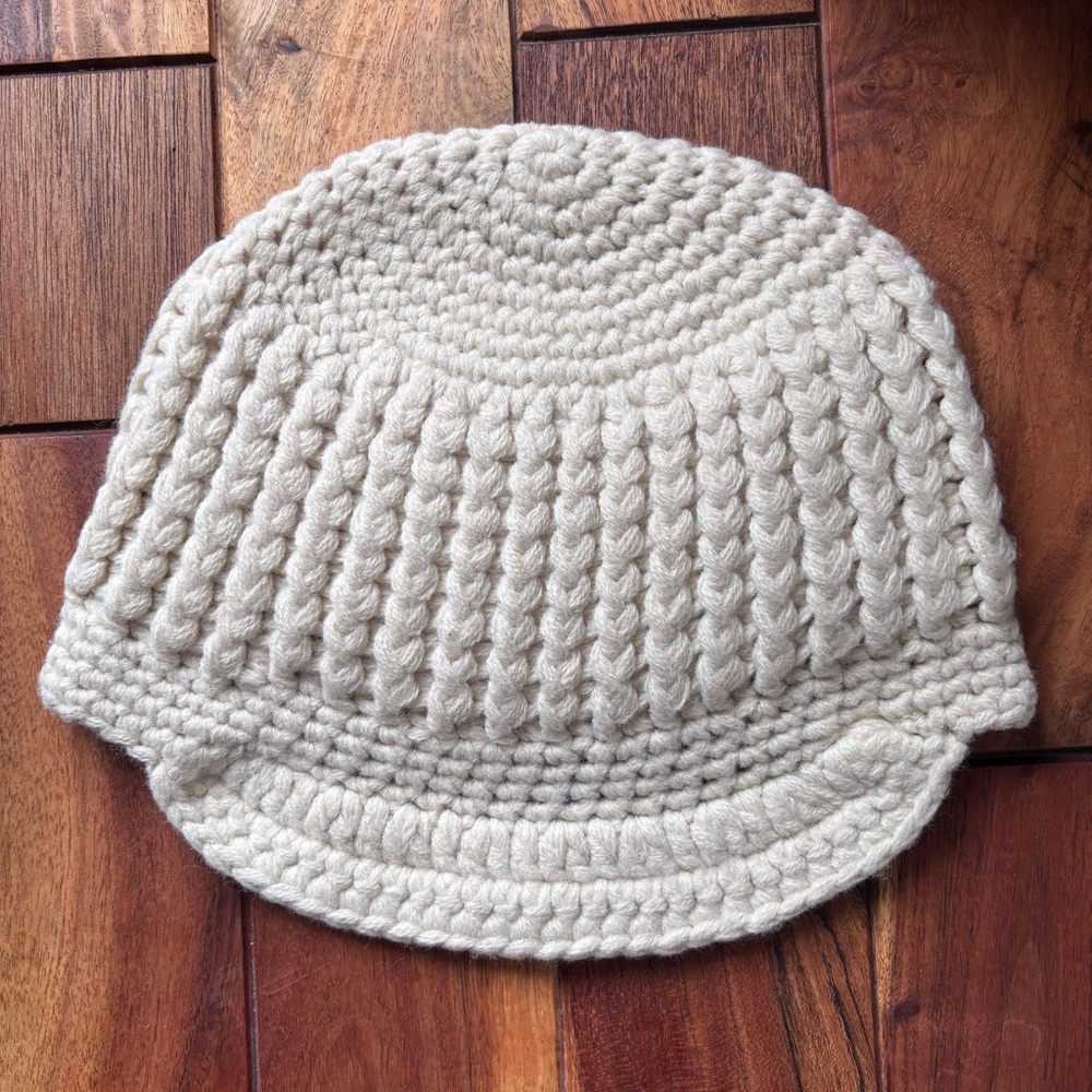 Cream, merino blend peaked hat